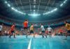 Match de handball intense en intérieur avec joueurs en action